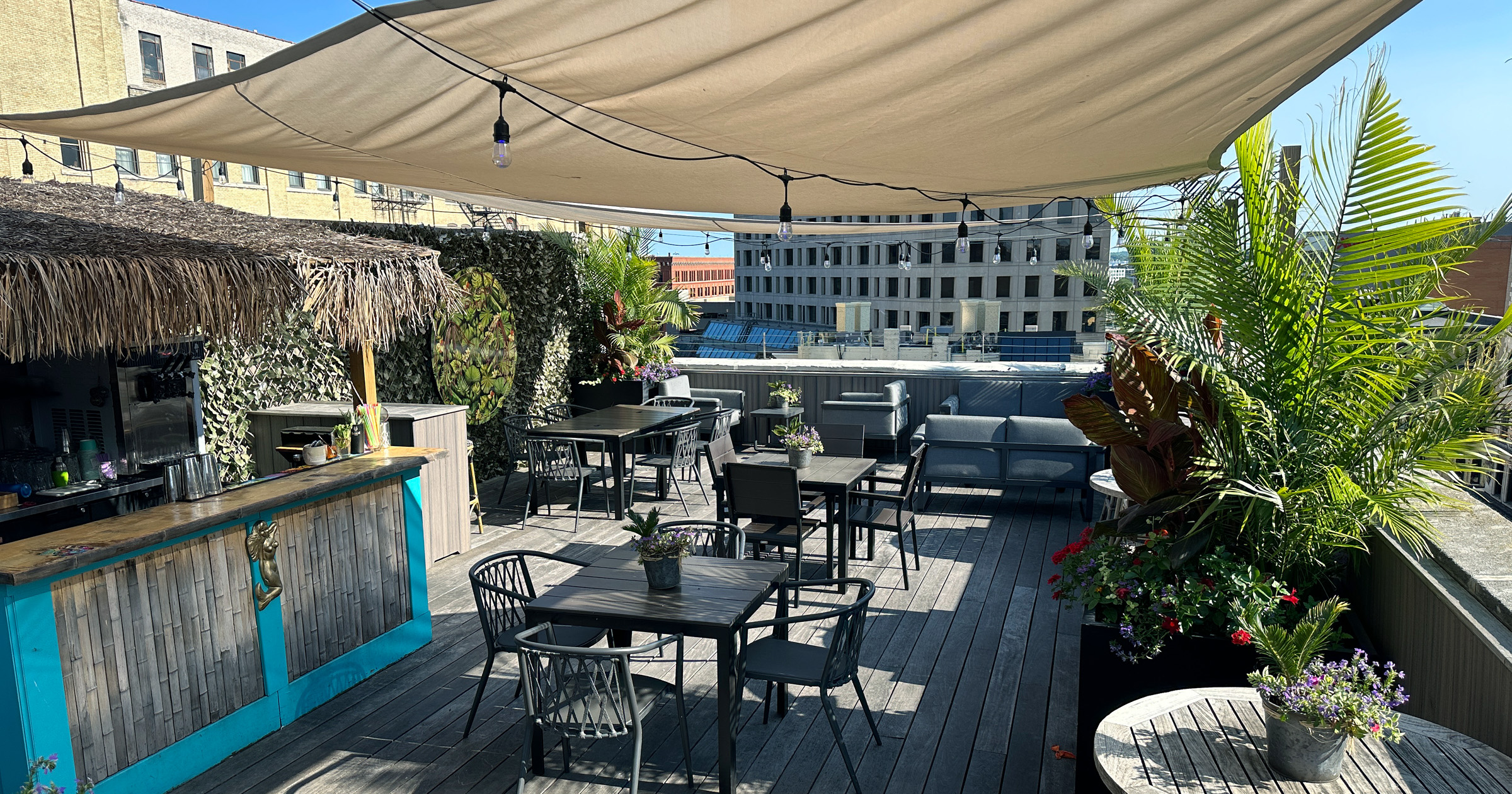 Rooftop patio view of Pufferfish Tiki bar on a sunny day.